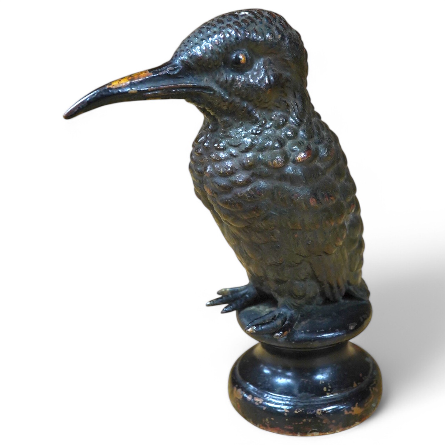 A cold painted bronze car mascot in the form of a kingfisher mounted on a circular socle, 12.5cm high. Condition - fair.